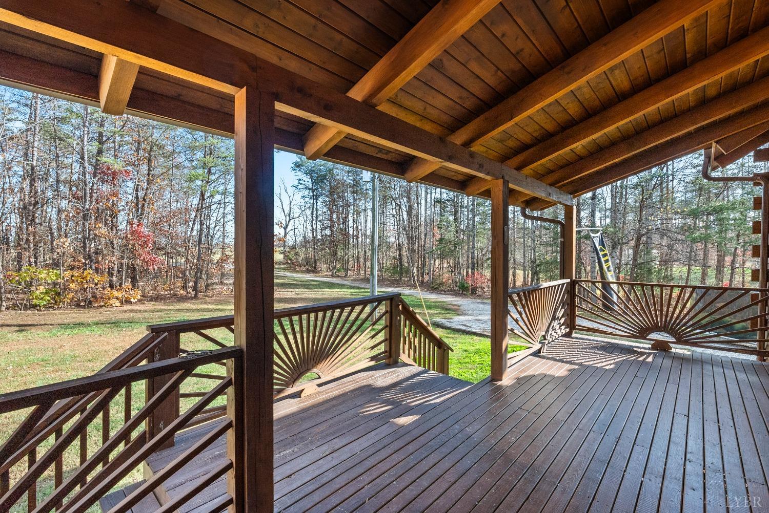 1069 Vineyard Road Spout Spring, VA 24538 - Photo 41 of 60 a view of a balcony with wooden floor