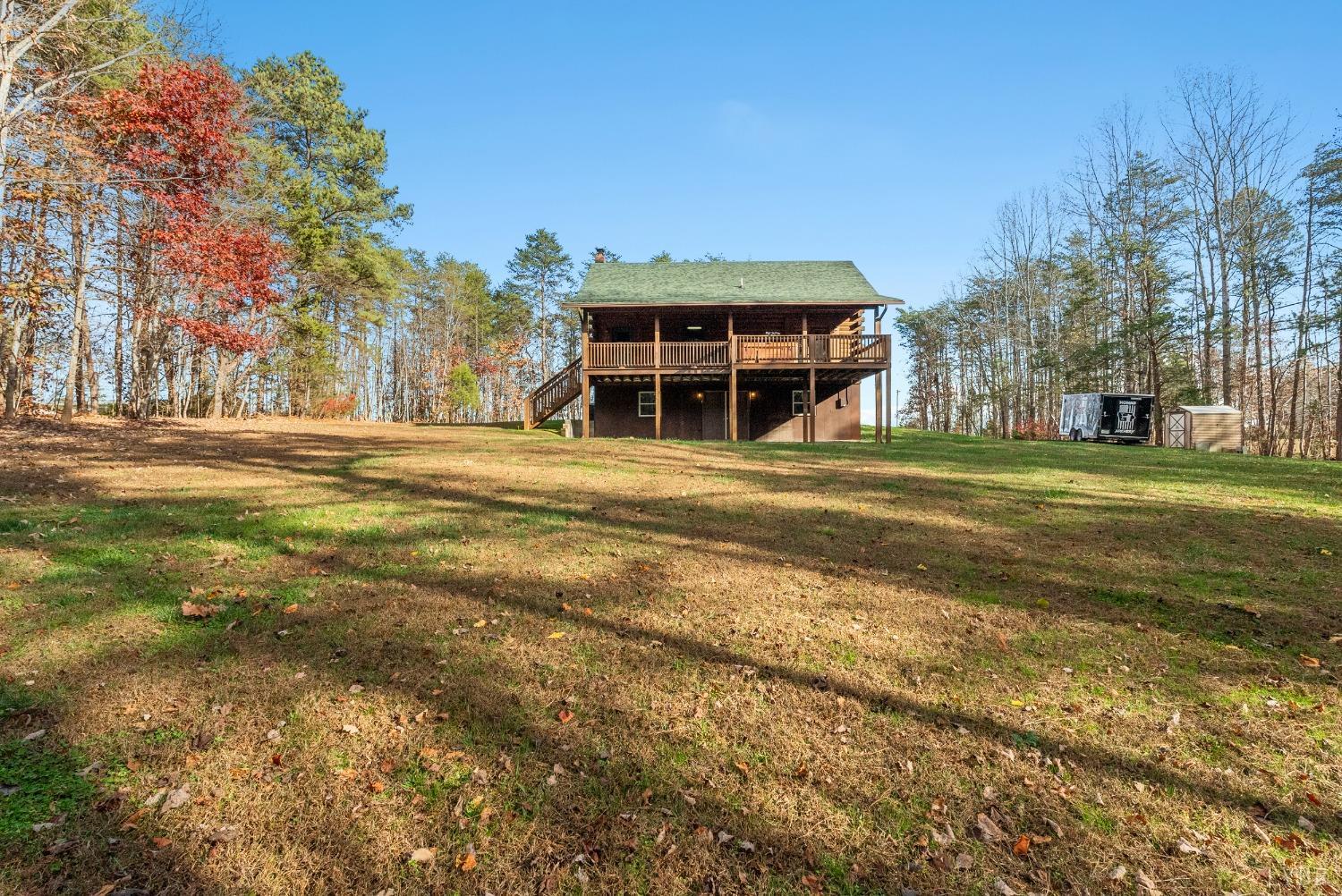1069 Vineyard Road Spout Spring, VA 24538 - Photo 45 of 60 a view of a house with a yard