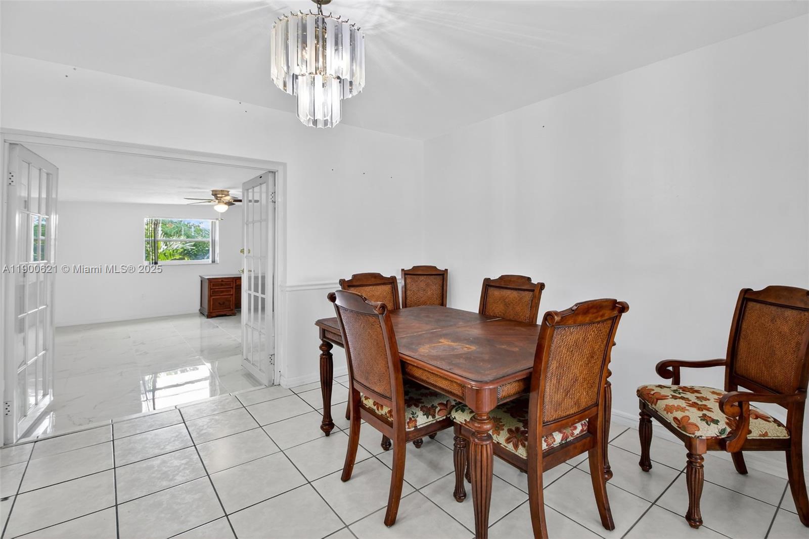 15403 Southwest 107th Court Miami, FL 33157 - Photo 15 of 48 a view of a dining room with furniture