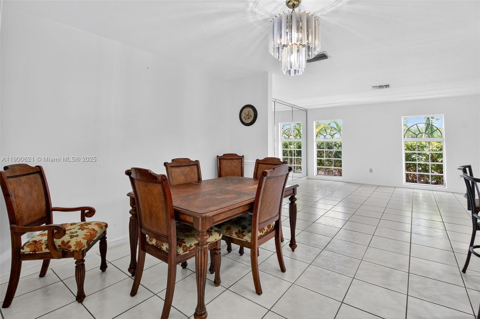 15403 Southwest 107th Court Miami, FL 33157 - Photo 16 of 48 a view of a dining room with furniture and window