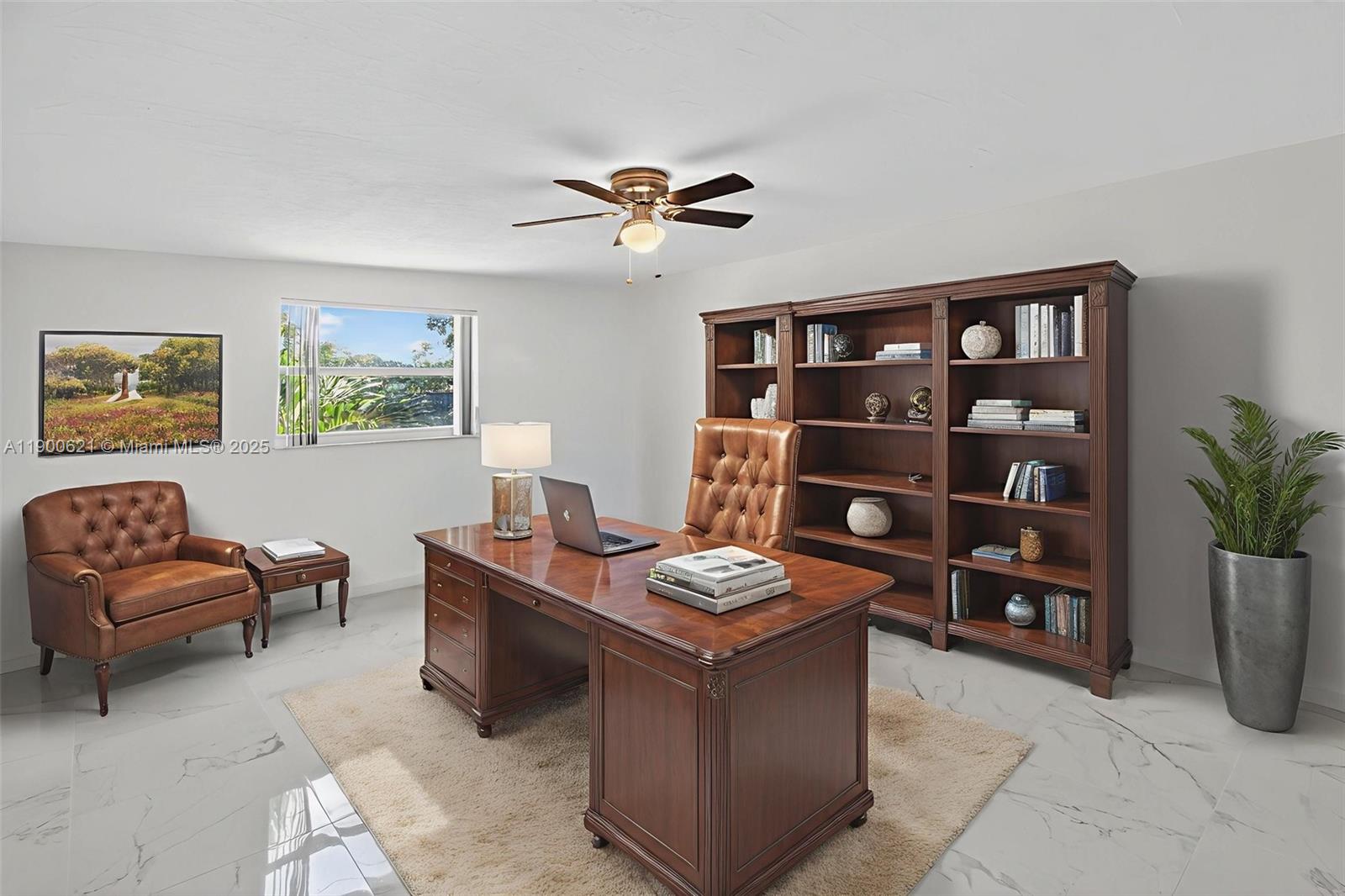 15403 Southwest 107th Court Miami, FL 33157 - Photo 19 of 48 a living room with furniture and book shelf