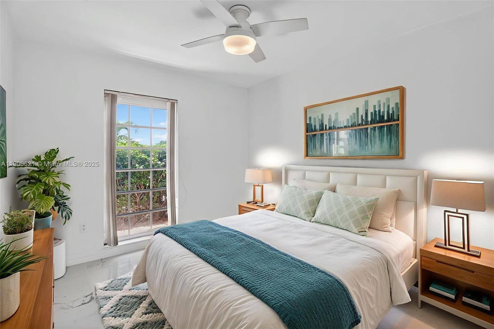 15403 Southwest 107th Court Miami, FL 33157 - Photo 23 of 48 a bedroom with a bed and a window