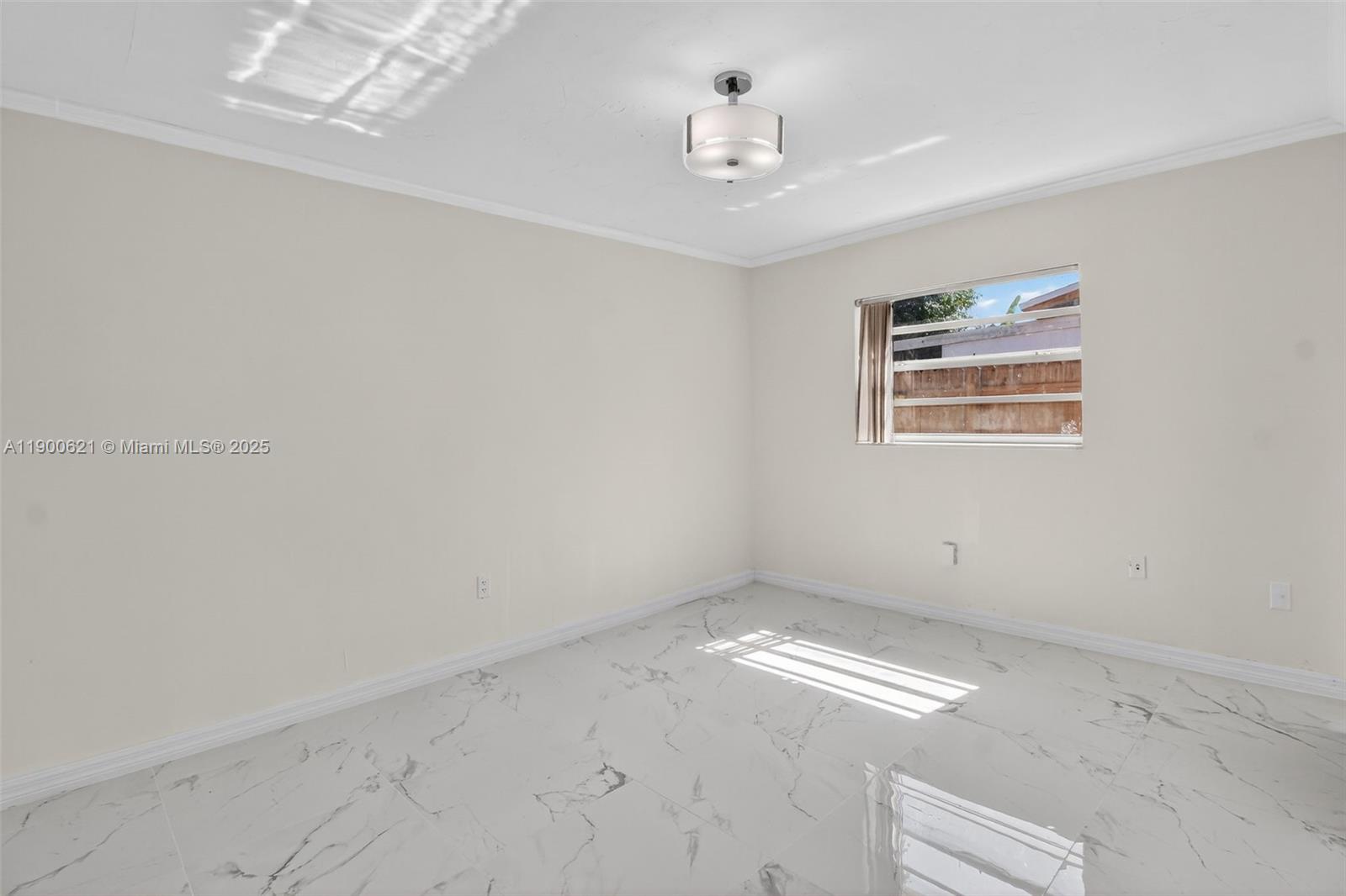 15403 Southwest 107th Court Miami, FL 33157 - Photo 25 of 48 a view of empty room with window