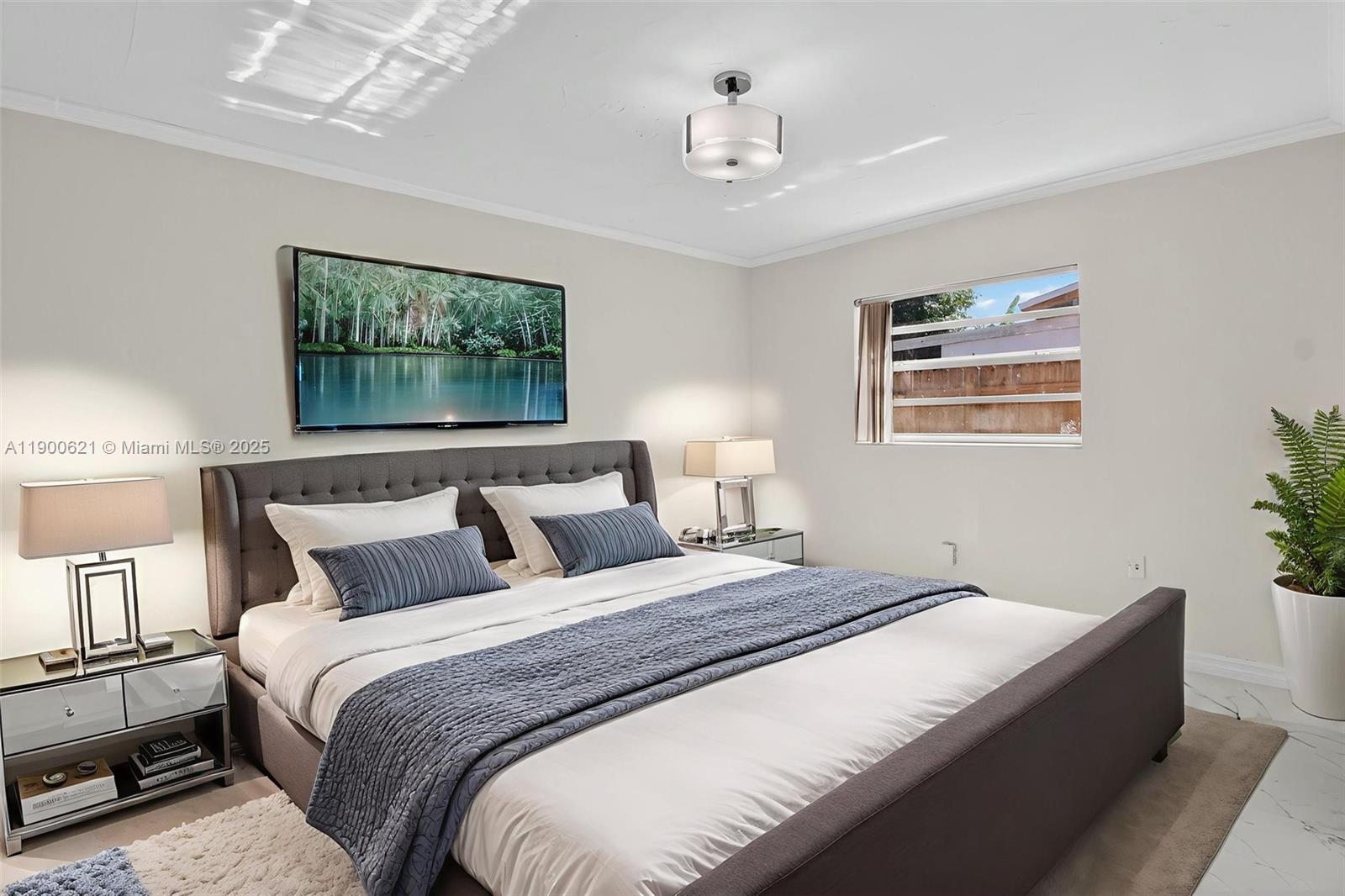 15403 Southwest 107th Court Miami, FL 33157 - Photo 26 of 48 a bedroom with bed and window