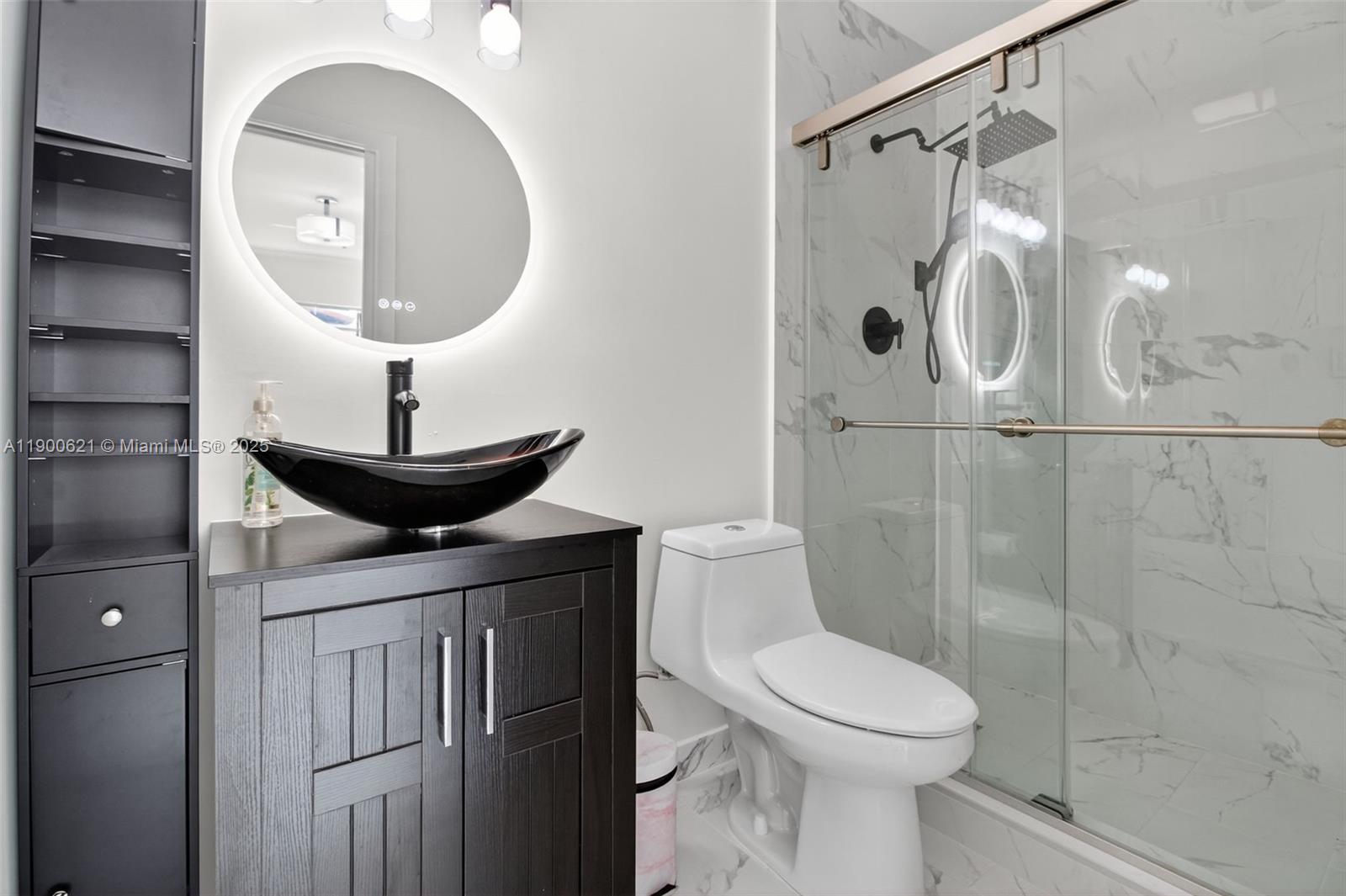 15403 Southwest 107th Court Miami, FL 33157 - Photo 29 of 48 a bathroom with a toilet a sink and shower