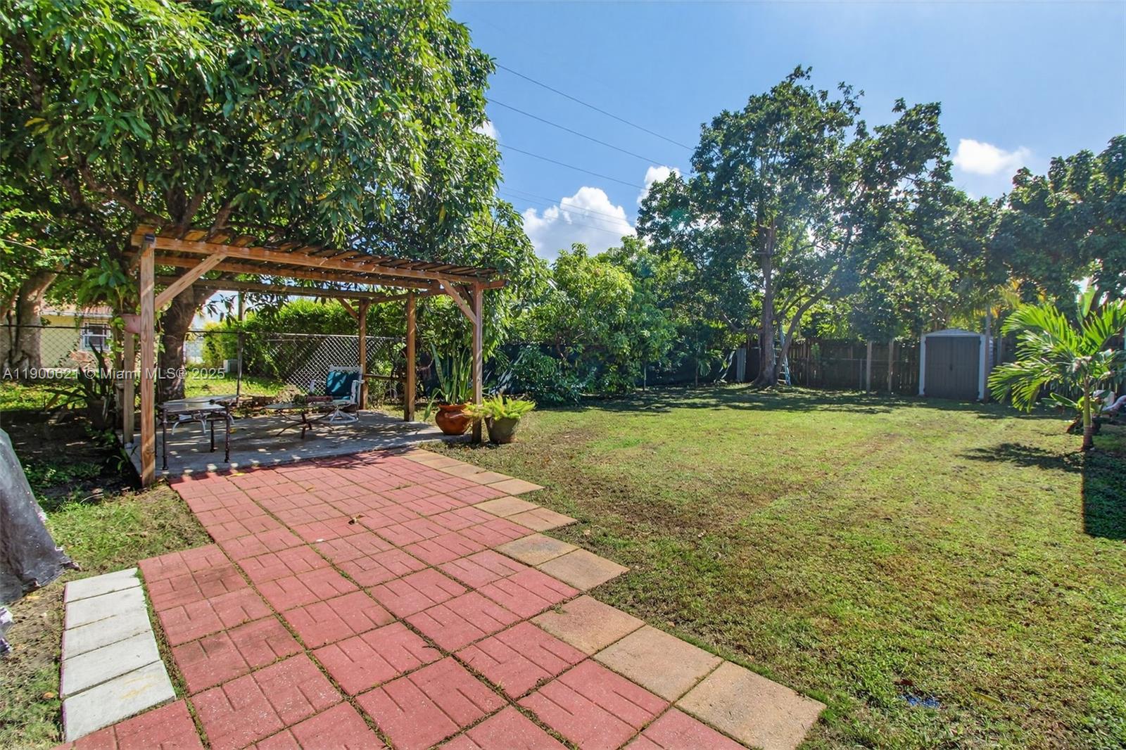 15403 Southwest 107th Court Miami, FL 33157 - Photo 36 of 48 a view of a backyard with sitting area