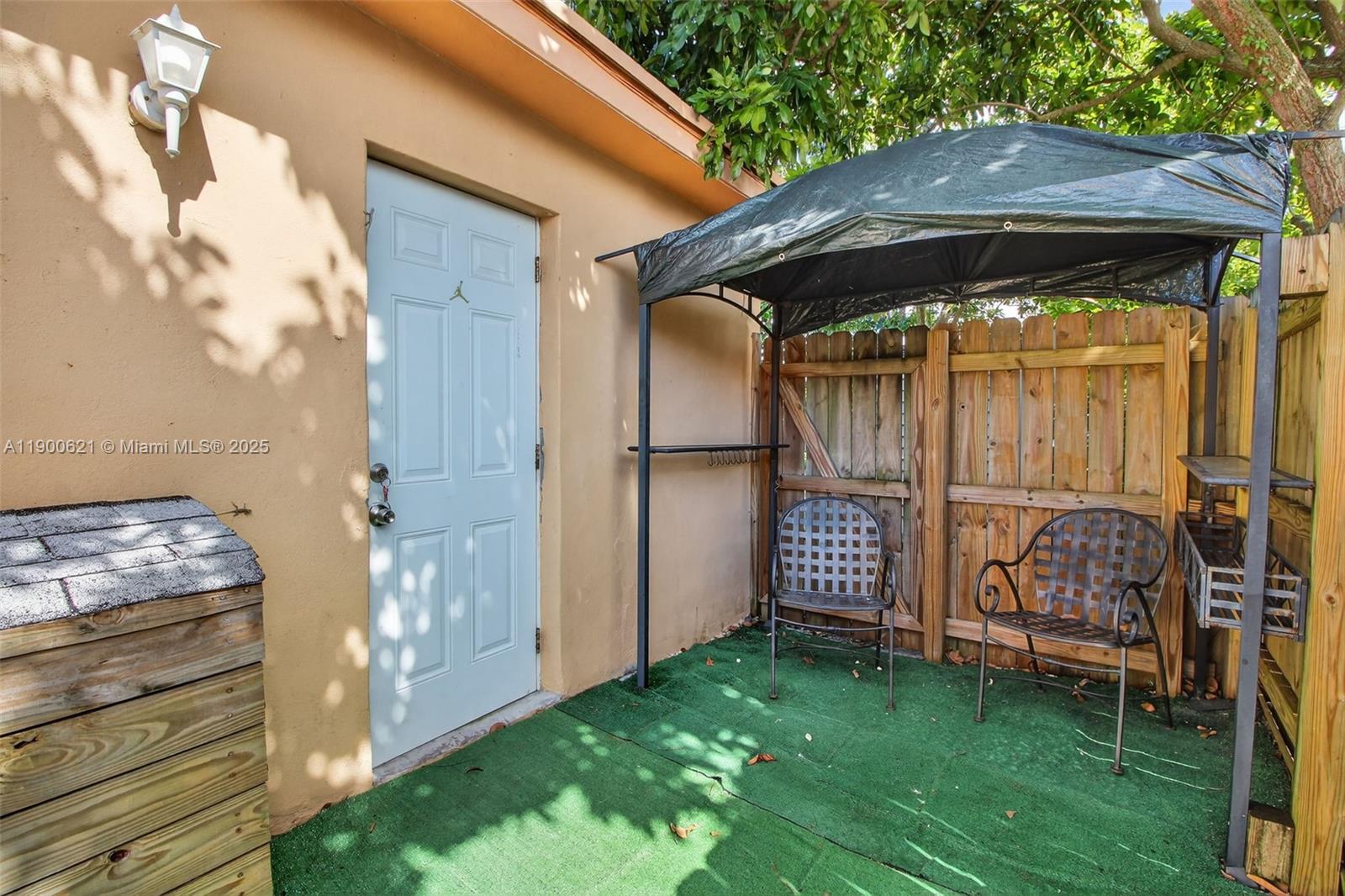 15403 Southwest 107th Court Miami, FL 33157 - Photo 40 of 48 a front view of a house with garden