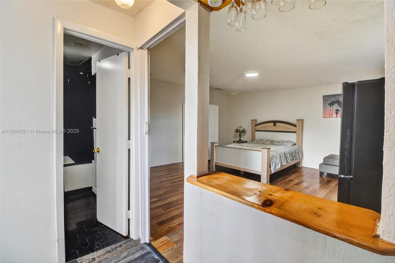 15403 Southwest 107th Court Miami, FL 33157 - Photo 41 of 48 a kitchen with a refrigerator and a stove