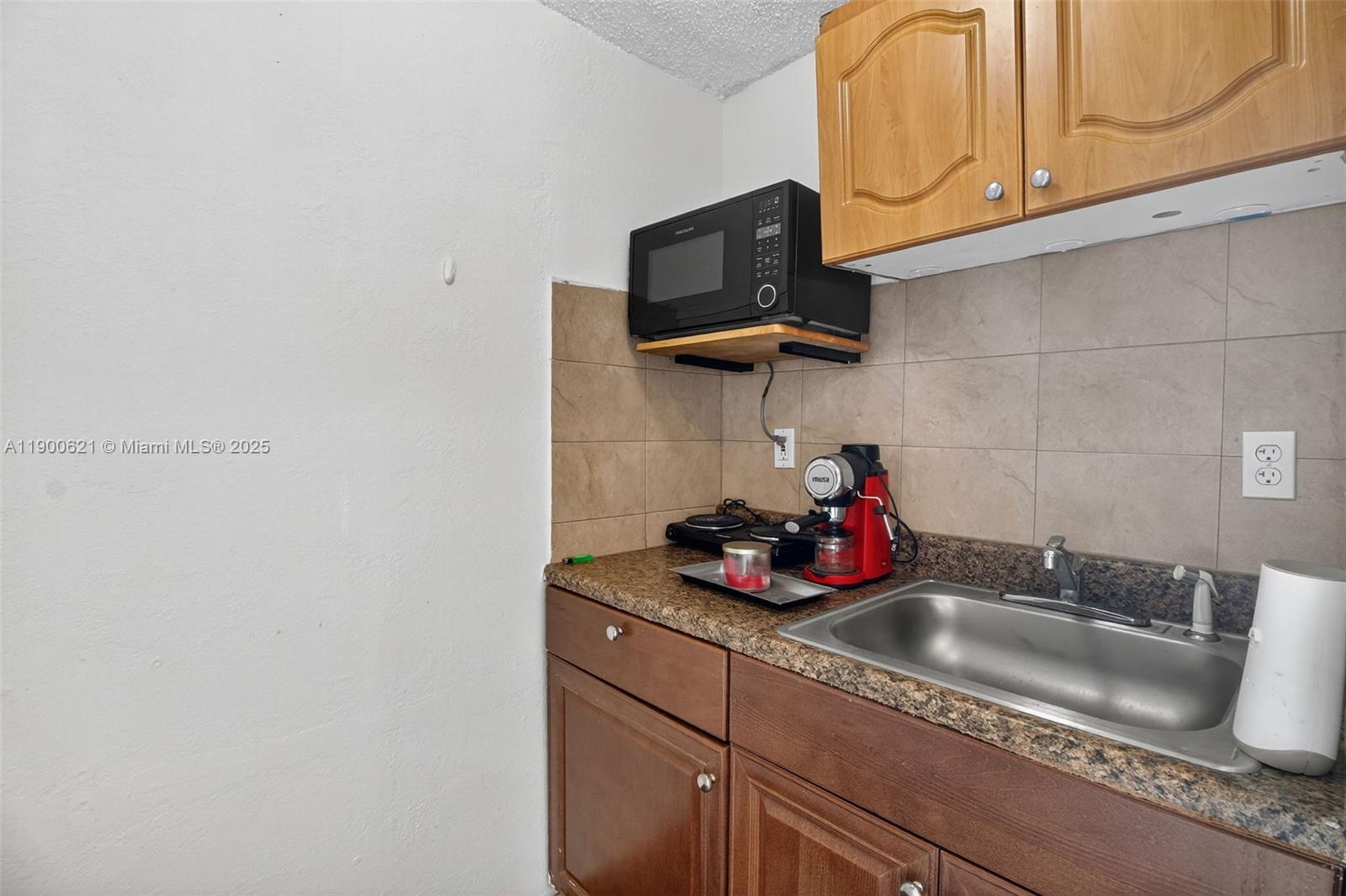 15403 Southwest 107th Court Miami, FL 33157 - Photo 42 of 48 a bathroom with a sink and a mirror