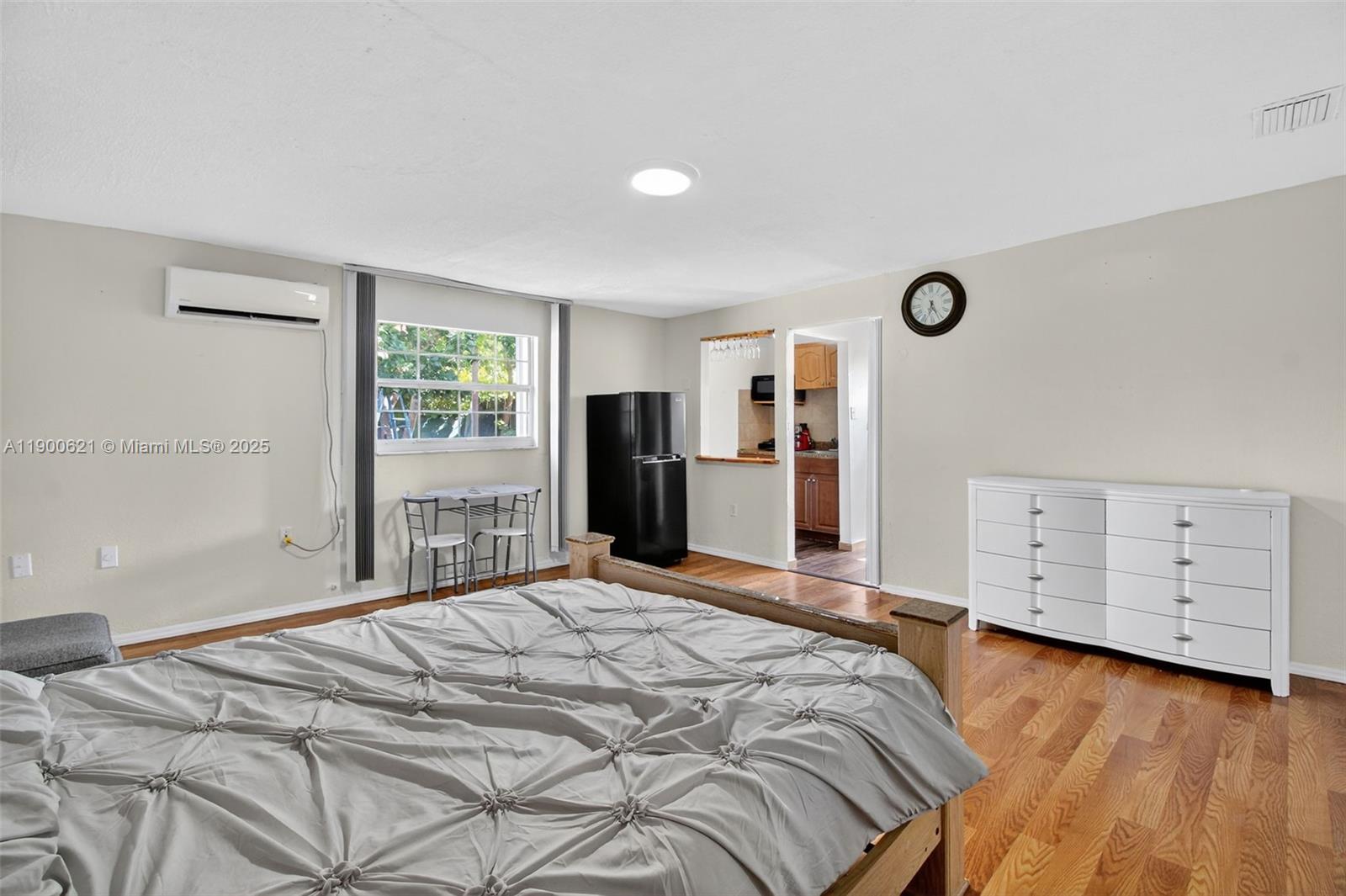 15403 Southwest 107th Court Miami, FL 33157 - Photo 44 of 48 a bedroom with a bed and a dresser