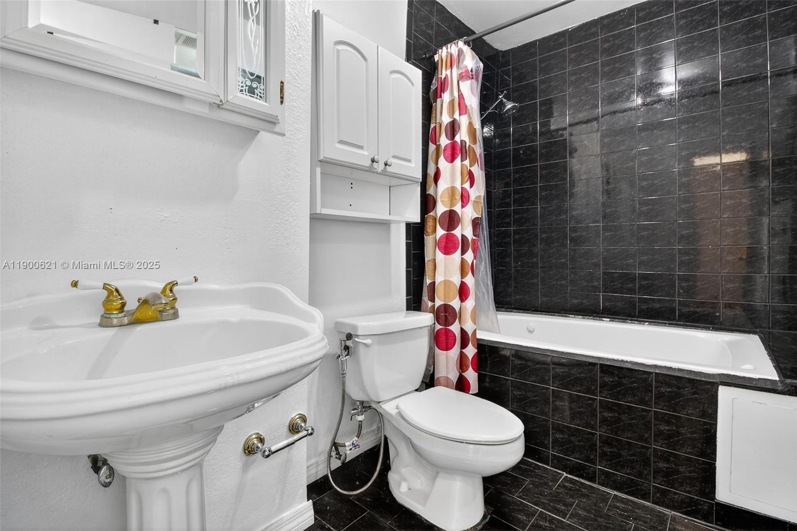 15403 Southwest 107th Court Miami, FL 33157 - Photo 45 of 48 a bathroom with a sink toilet and shower