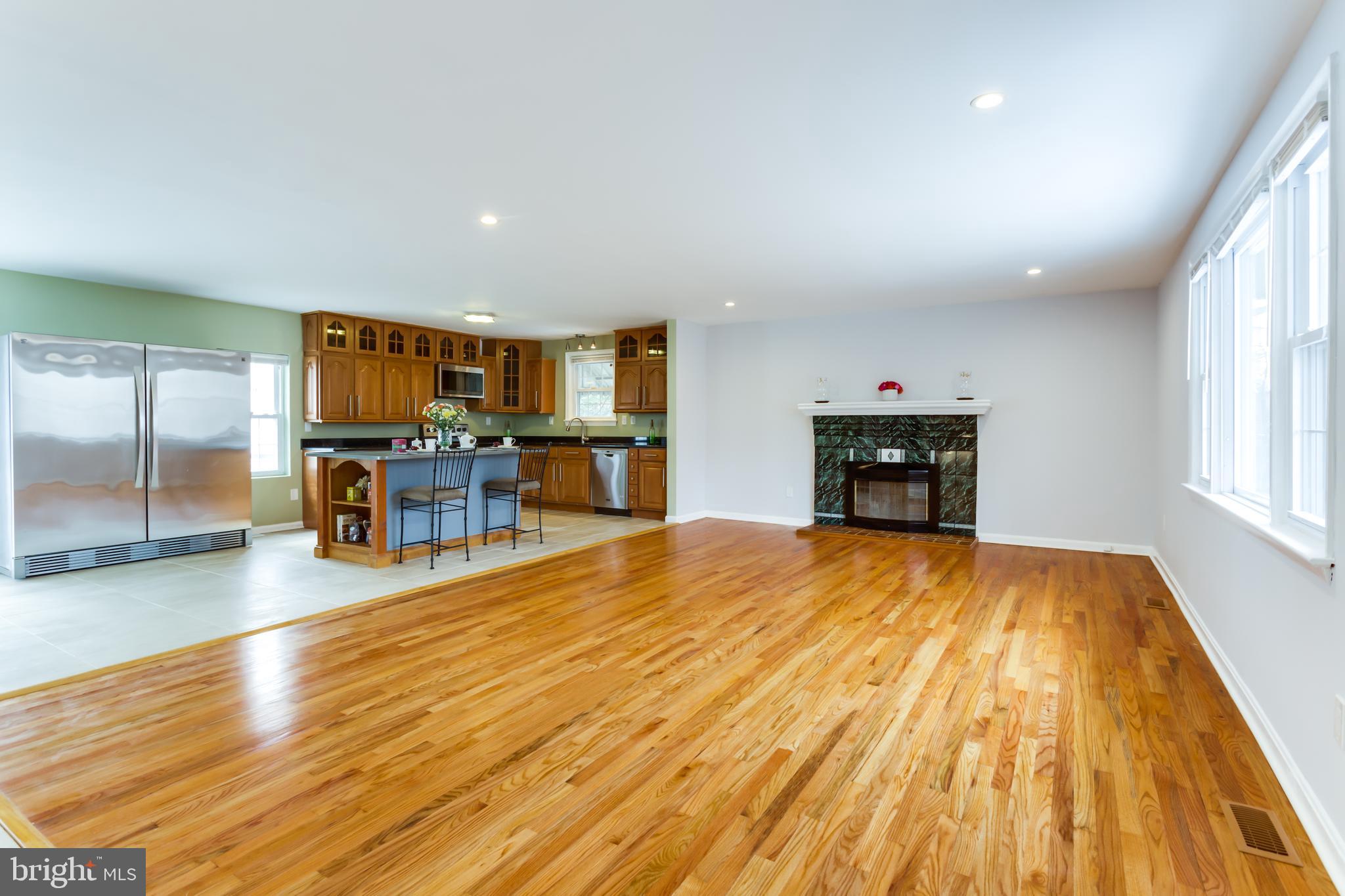 1603 Thomas Road Fort Washington, MD 20744 - Photo 2 of 40 Open Living room with fireplace