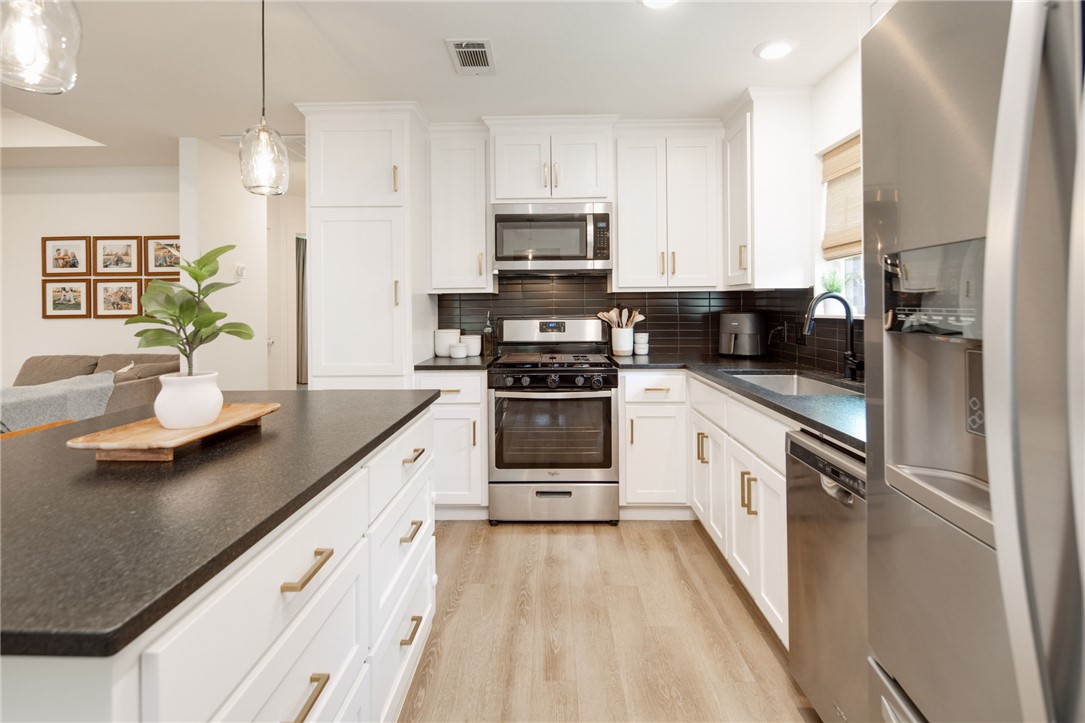 4700 Kensington Road Bryan, TX 77802 - Photo 11 of 31 Kitchen featuring stainless steel appliances