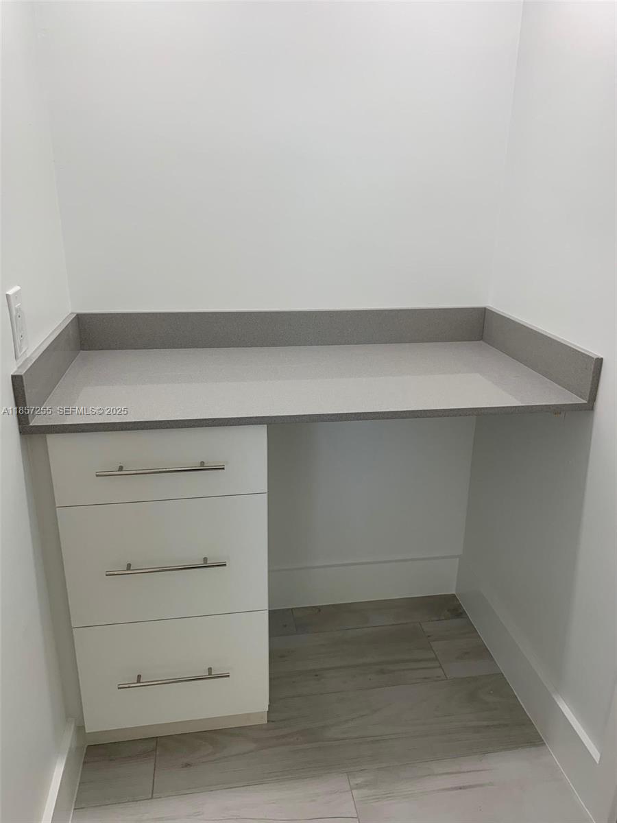 6825 Southwest 45th Lane, Unit 7 Miami, FL 33155 - Photo 18 of 30 a view of an empty room