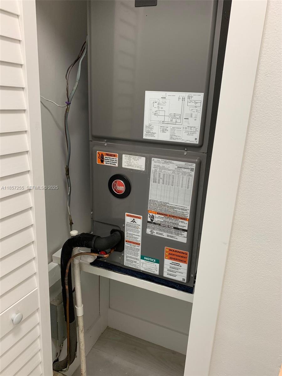 6825 Southwest 45th Lane, Unit 7 Miami, FL 33155 - Photo 28 of 30 a view of washer and dryer