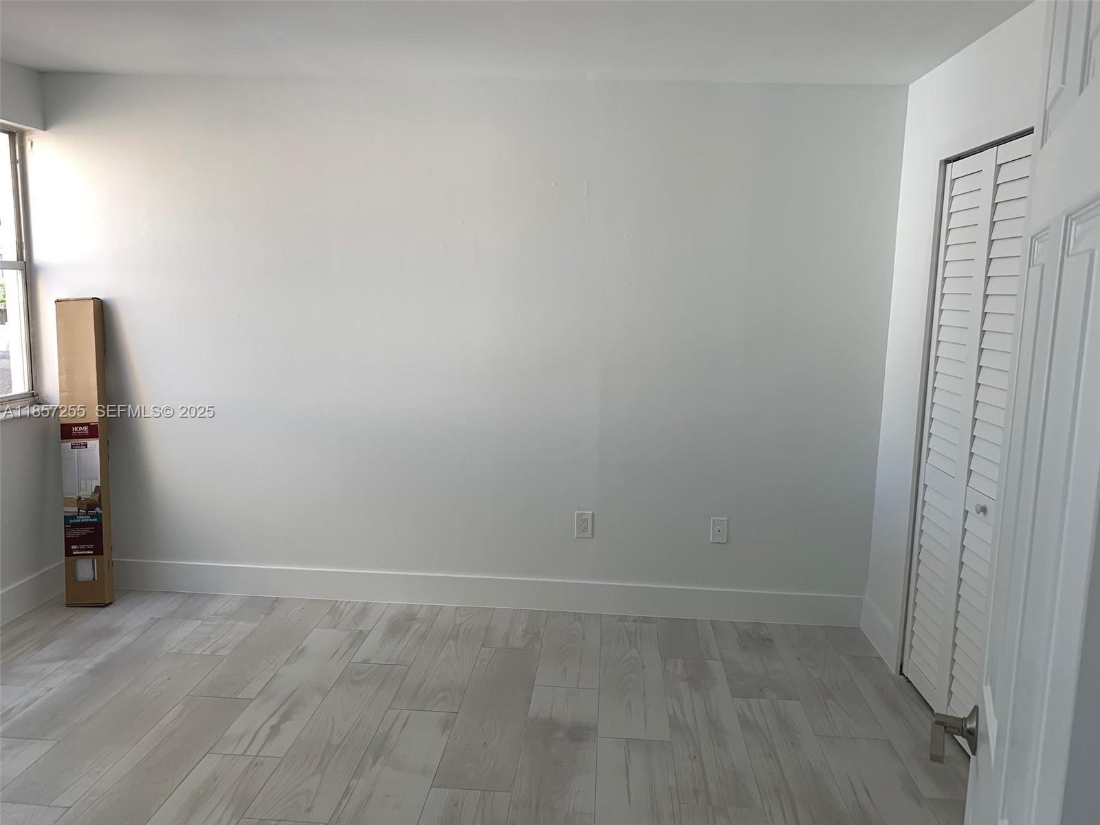 6825 Southwest 45th Lane, Unit 7 Miami, FL 33155 - Photo 10 of 30 a view of an empty room
