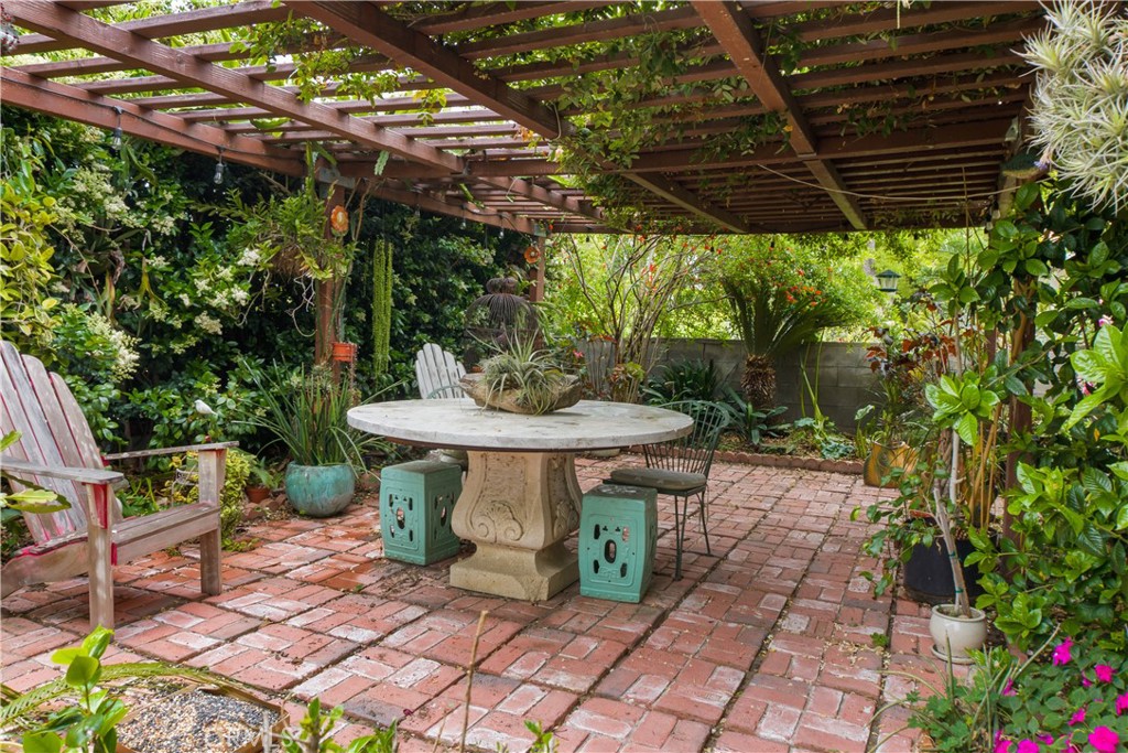 808 South Los Robles Avenue Pasadena, CA 91106 - Photo 1 of 1 a view of a chairs and table in the patio