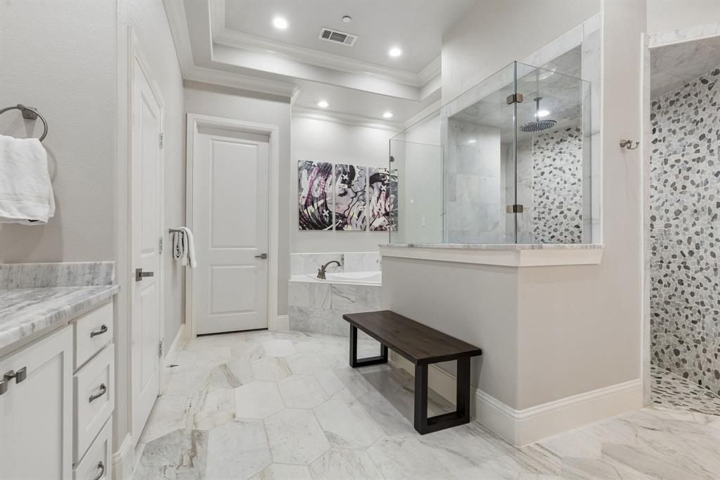 6700 Herbert Road Colleyville, TX 76034 - Photo 7 of 32 a spacious bathroom with a shower sink and mirror