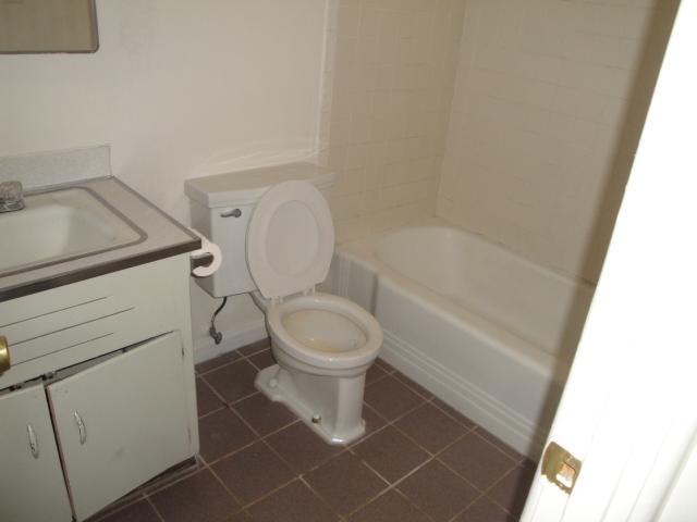 1710 East Cheery Lynn Road Phoenix, AZ 85016 - Photo 8 of 11 a bathroom with a toilet and a sink