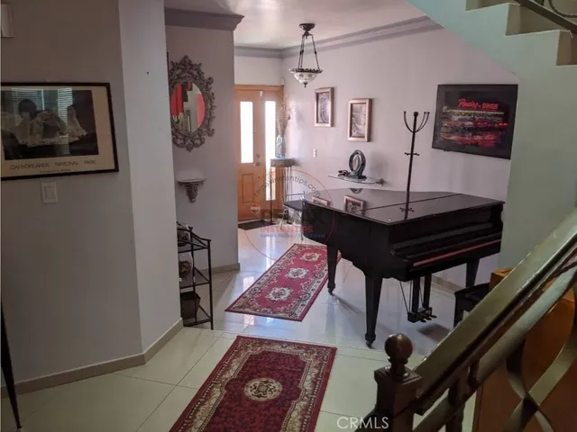 a room with table and chairs