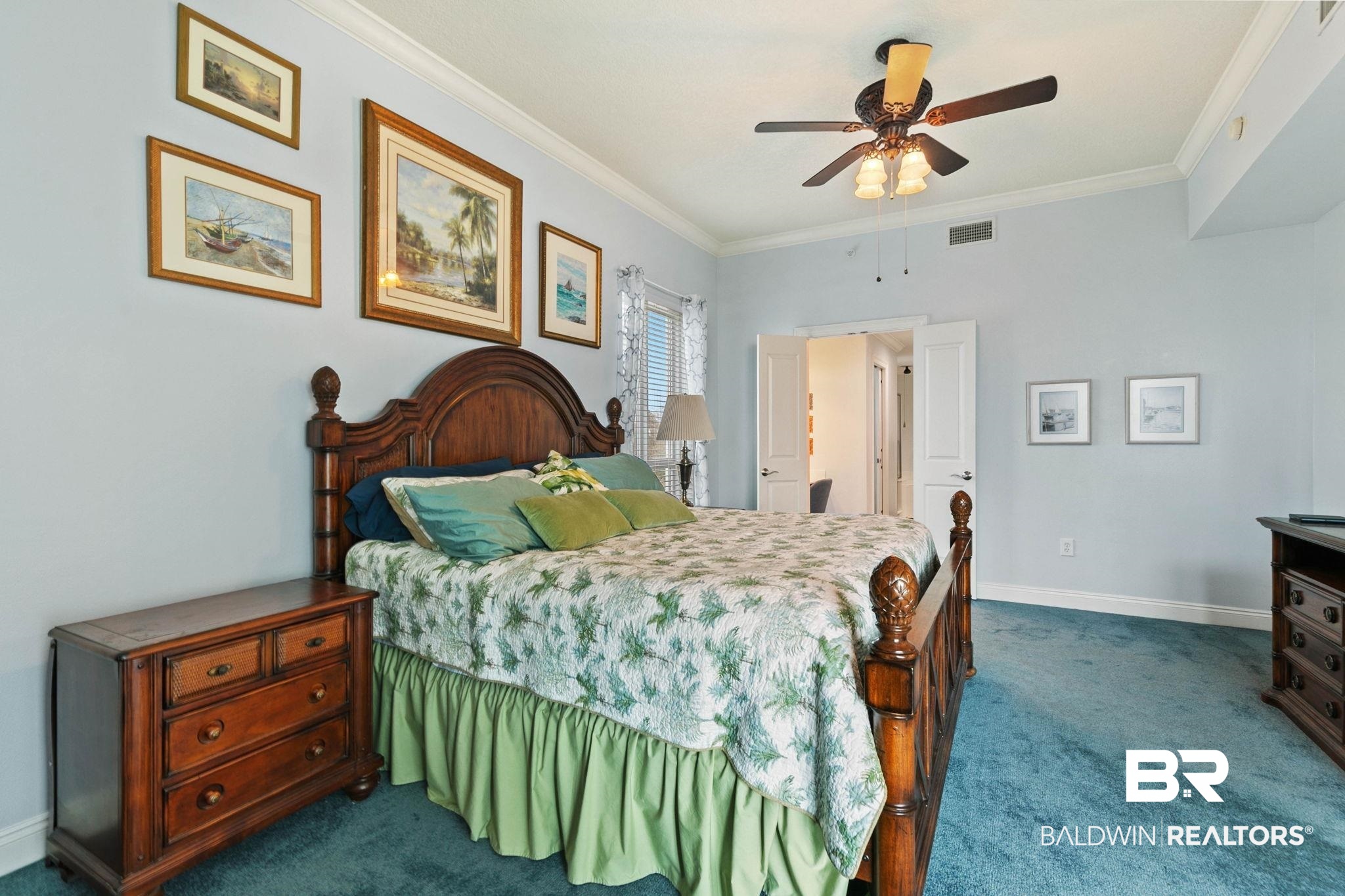 28250 Canal Road, Unit 208 Orange Beach, AL 36561 - Photo 26 of 53 Bedroom with dark colored carpet, ceiling fan, and crown molding