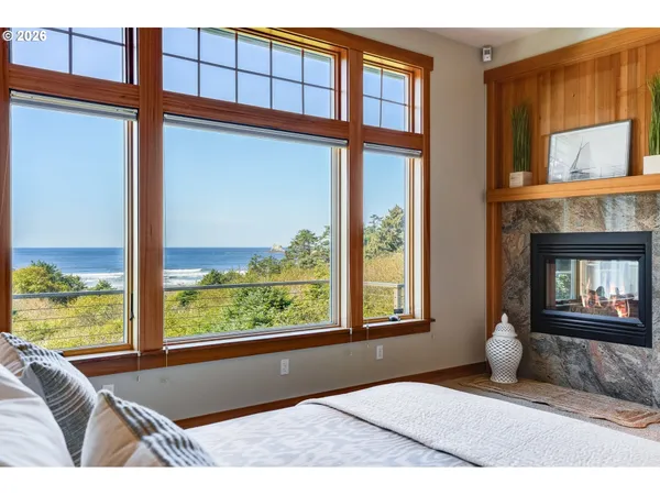 a living room filled with furniture and a window