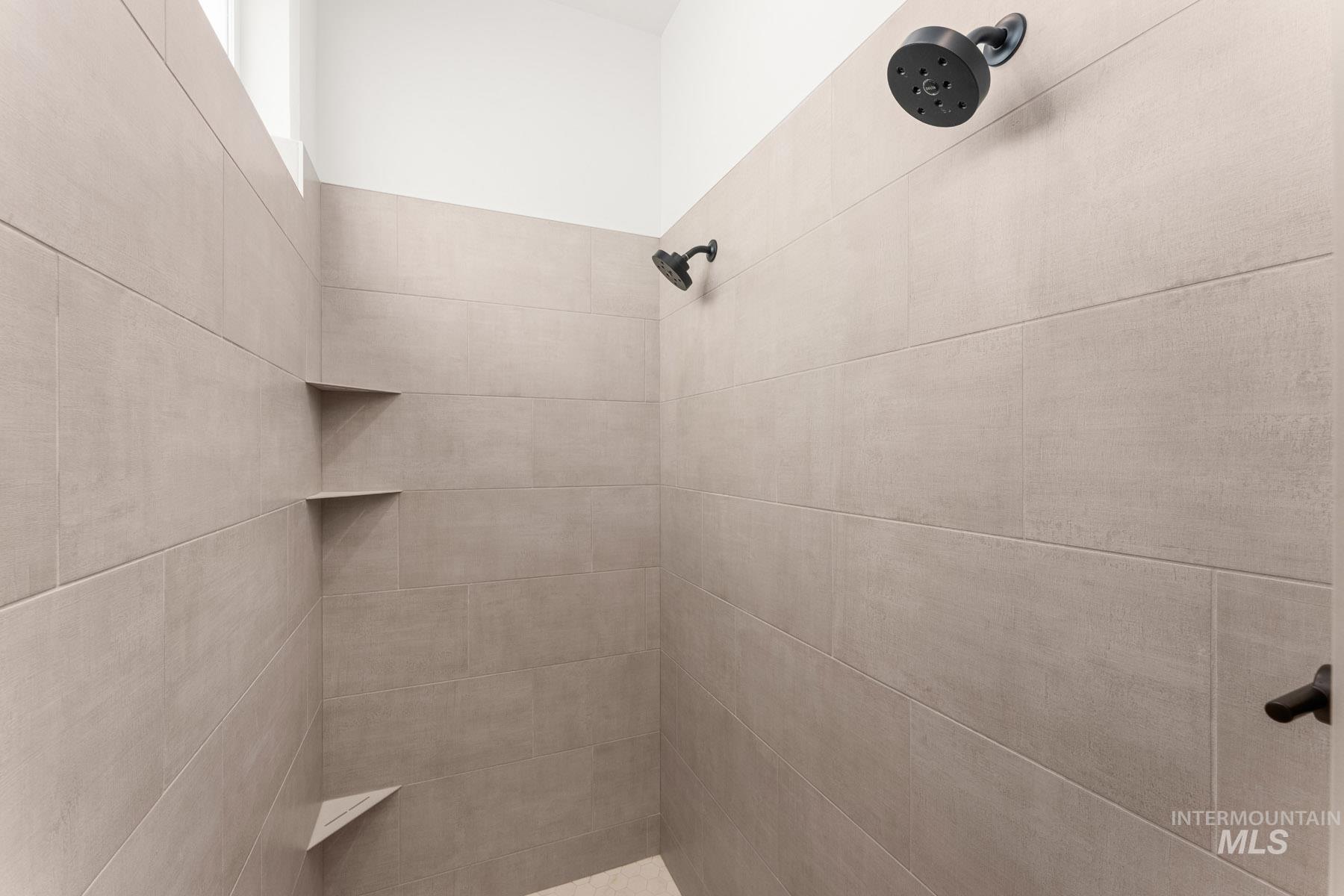 6954 Saddle Bred Way Star, ID 83669 - Photo 23 of 49 Bathroom with a tile shower