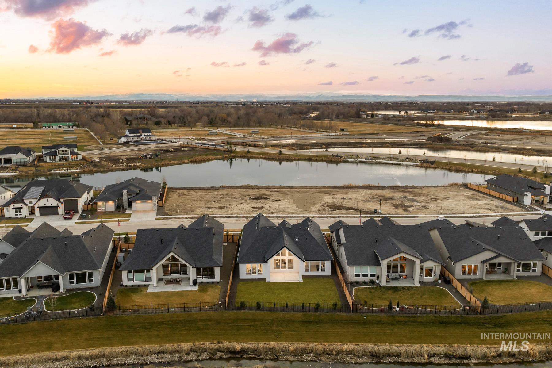 6954 Saddle Bred Way Star, ID 83669 - Photo 39 of 50 Aerial view at dusk of a water view and a residential view