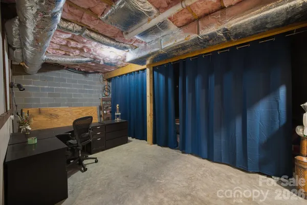 a view of a backyard of a chair