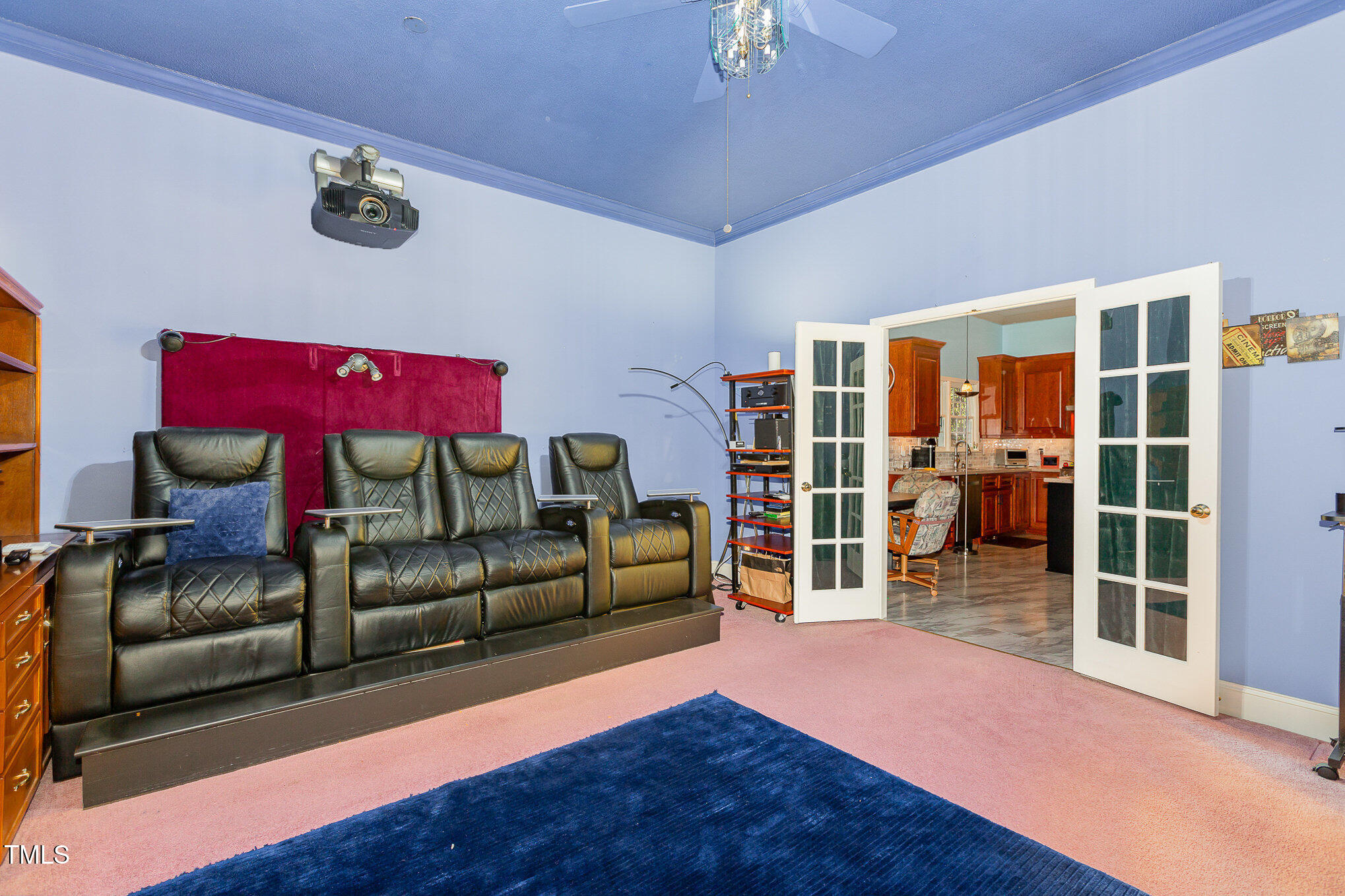 1508 High Holly Lane Raleigh, NC 27614 - Photo 31 of 46 French Doors into home theatre with luxury seating