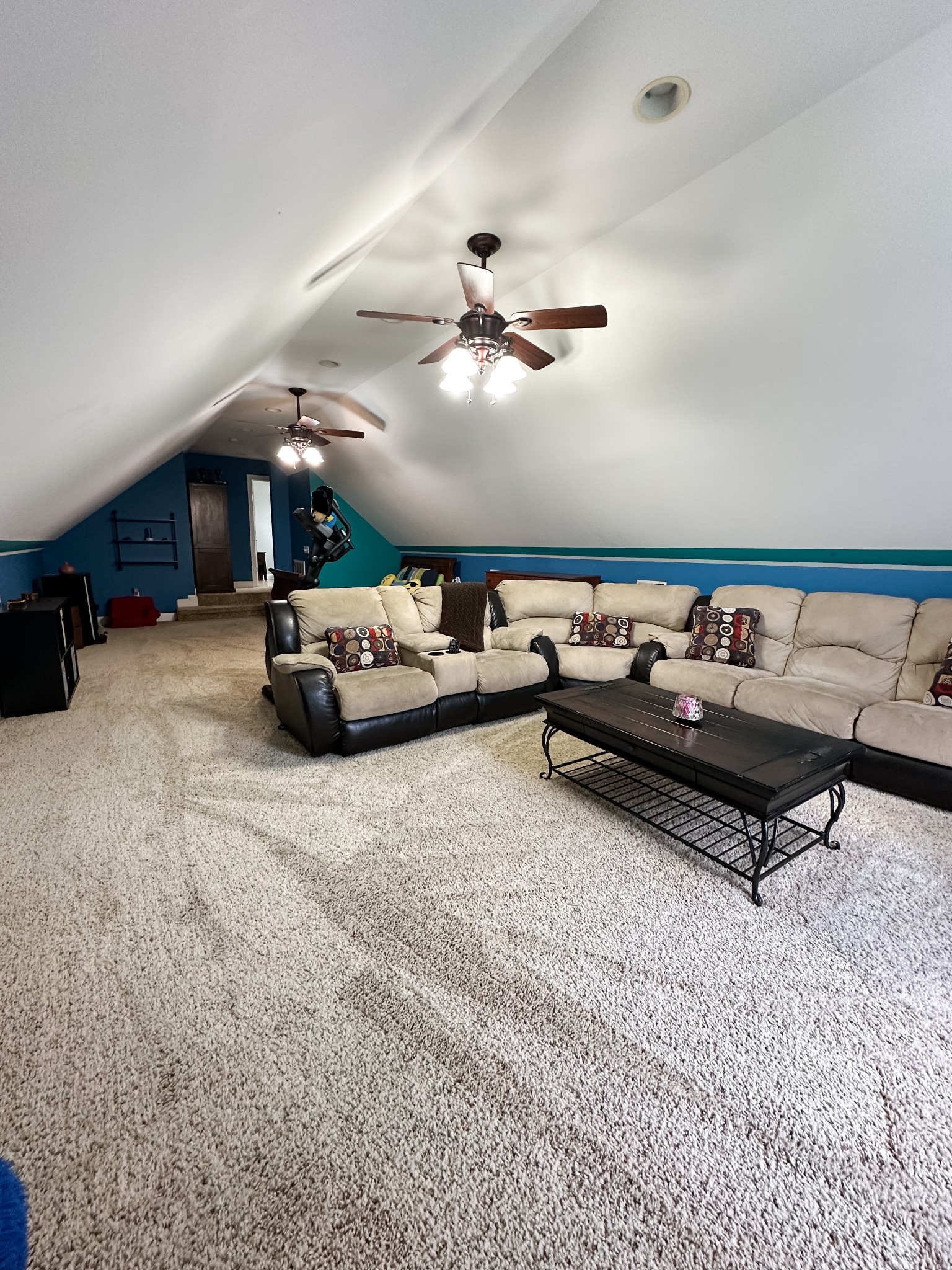 252 County House Hollow Road Cottontown, TN 37048 - Photo 22 of 50 a living room with furniture and a chandelier