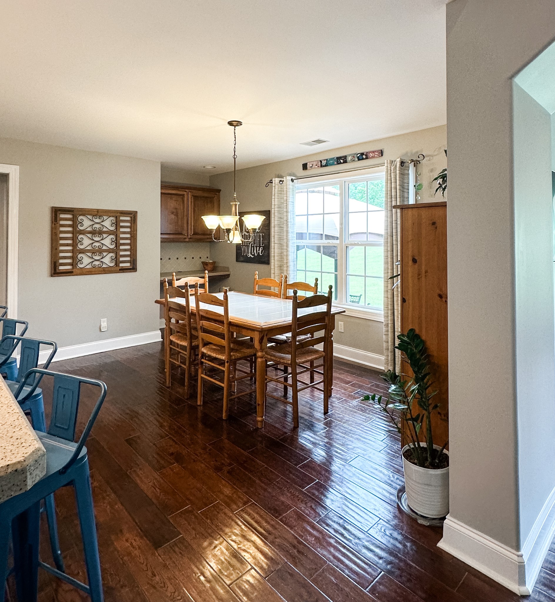 252 County House Hollow Road Cottontown, TN 37048 - Photo 29 of 50 a view of a dining room with furniture window and wooden floor