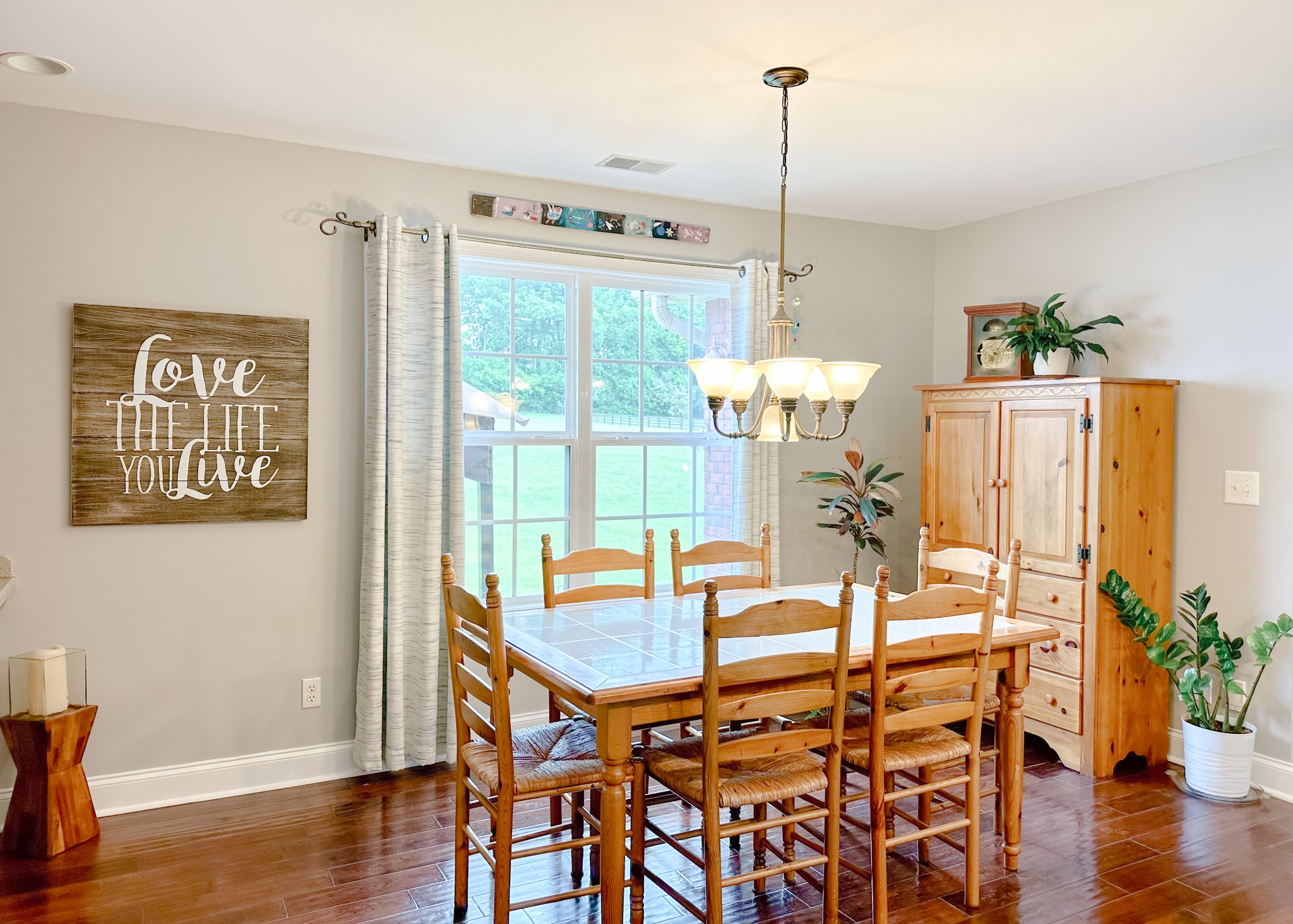 252 County House Hollow Road Cottontown, TN 37048 - Photo 31 of 50 a dining room with furniture window and wooden floor