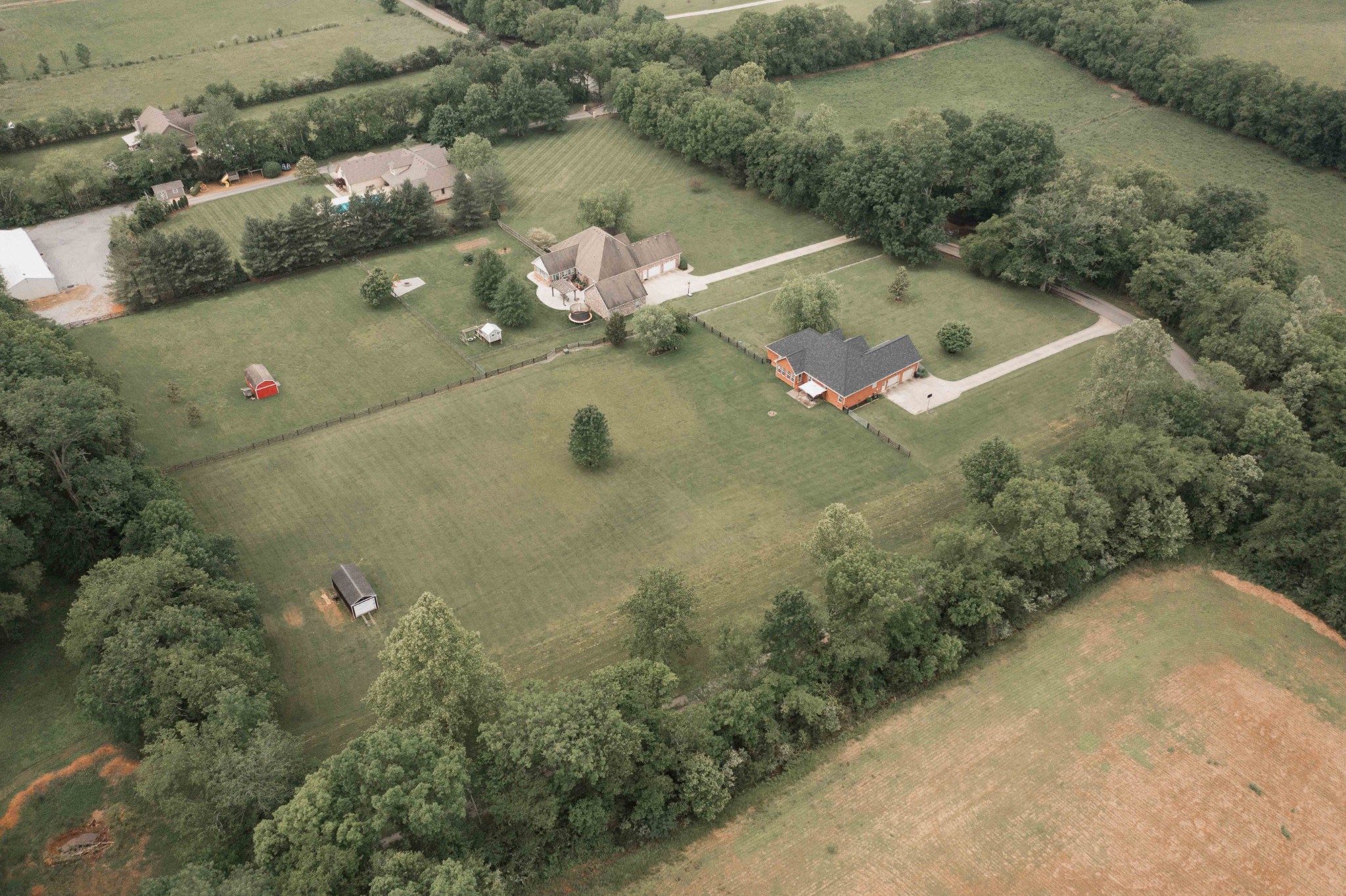 252 County House Hollow Road Cottontown, TN 37048 - Photo 45 of 50 an aerial view of a house with a yard
