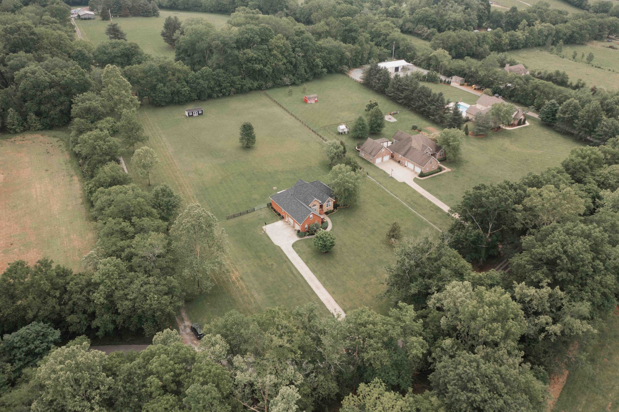 252 County House Hollow Road Cottontown, TN 37048 - Photo 46 of 50 an aerial view of a house with a yard