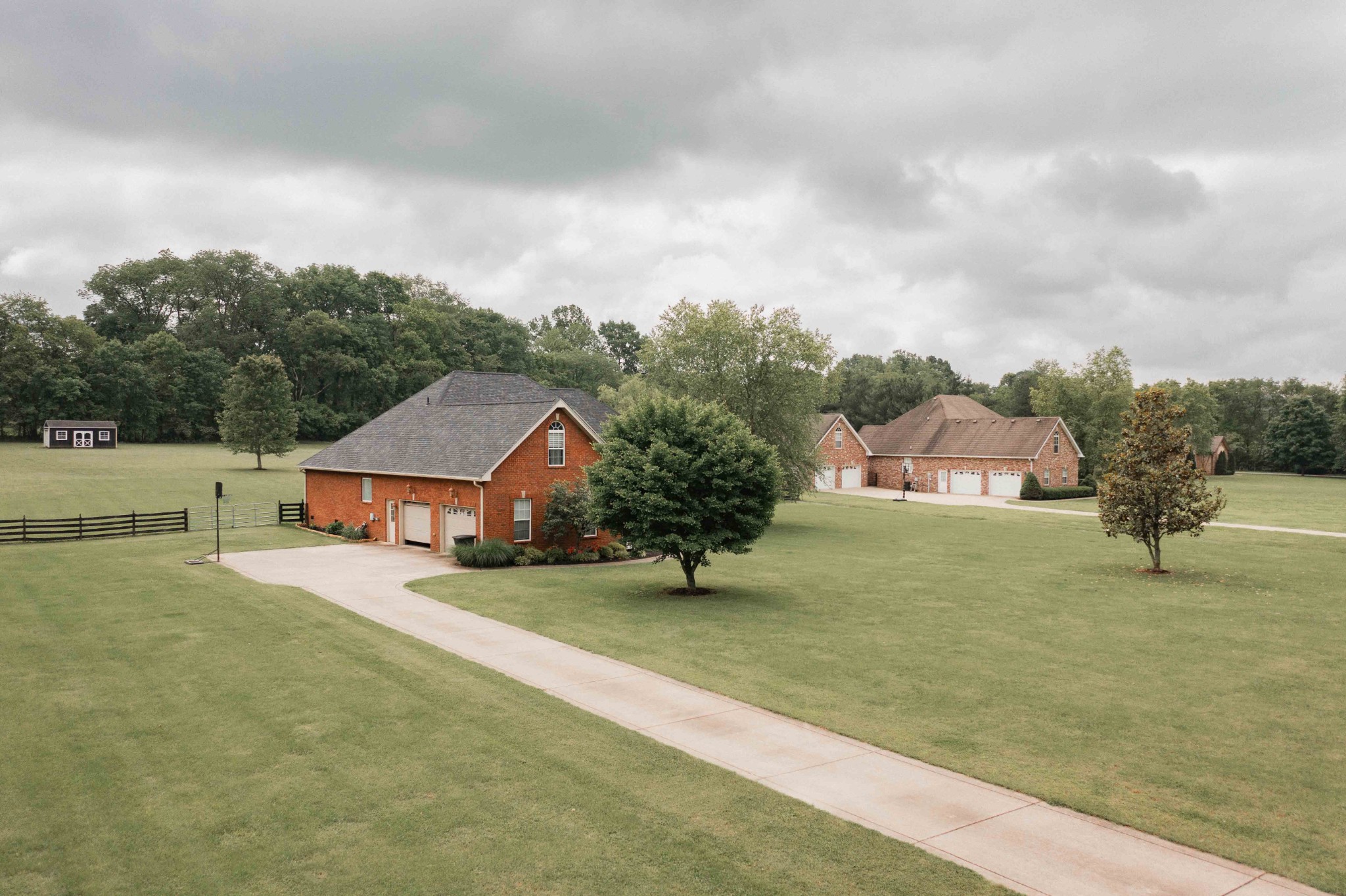 252 County House Hollow Road Cottontown, TN 37048 - Photo 47 of 50 a front view of a house with a yard and garage