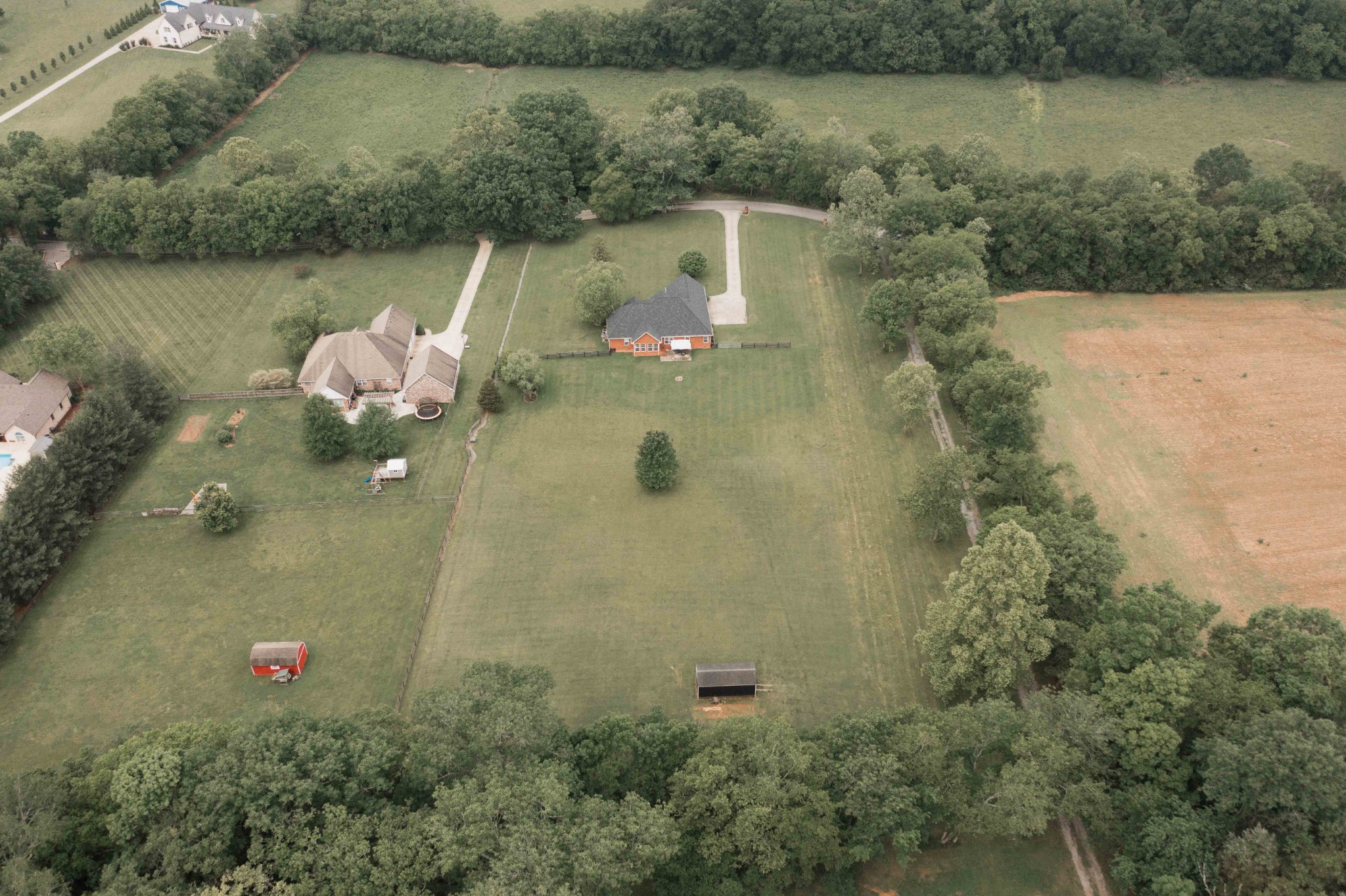 252 County House Hollow Road Cottontown, TN 37048 - Photo 48 of 50 an aerial view of a house with a yard