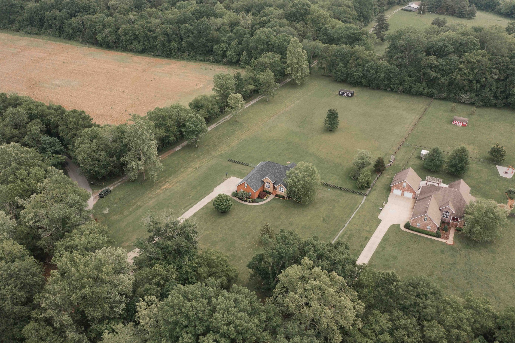 252 County House Hollow Road Cottontown, TN 37048 - Photo 49 of 50 a backyard of a house with lots of green space
