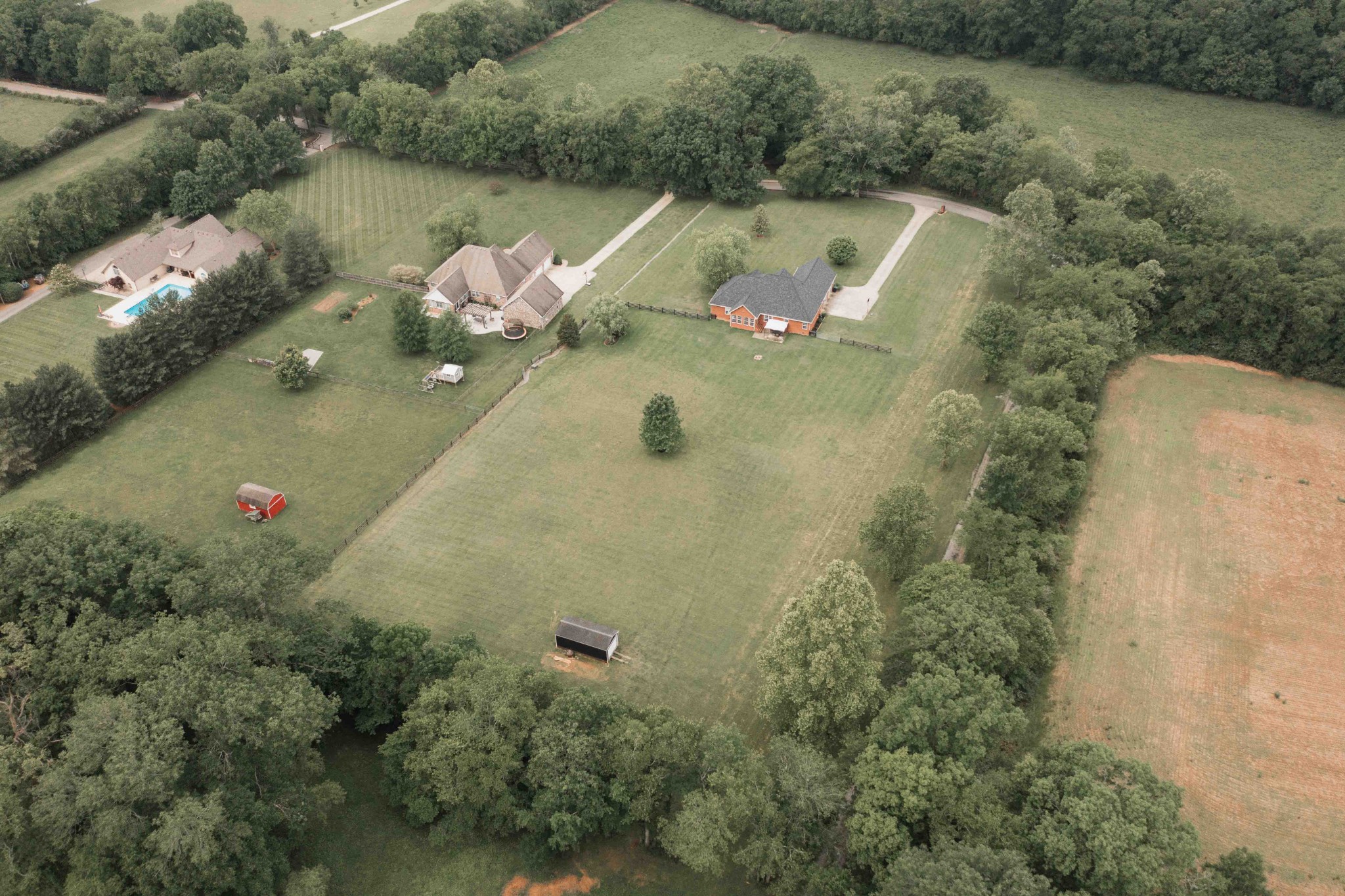252 County House Hollow Road Cottontown, TN 37048 - Photo 50 of 50 an aerial view of a house with a yard