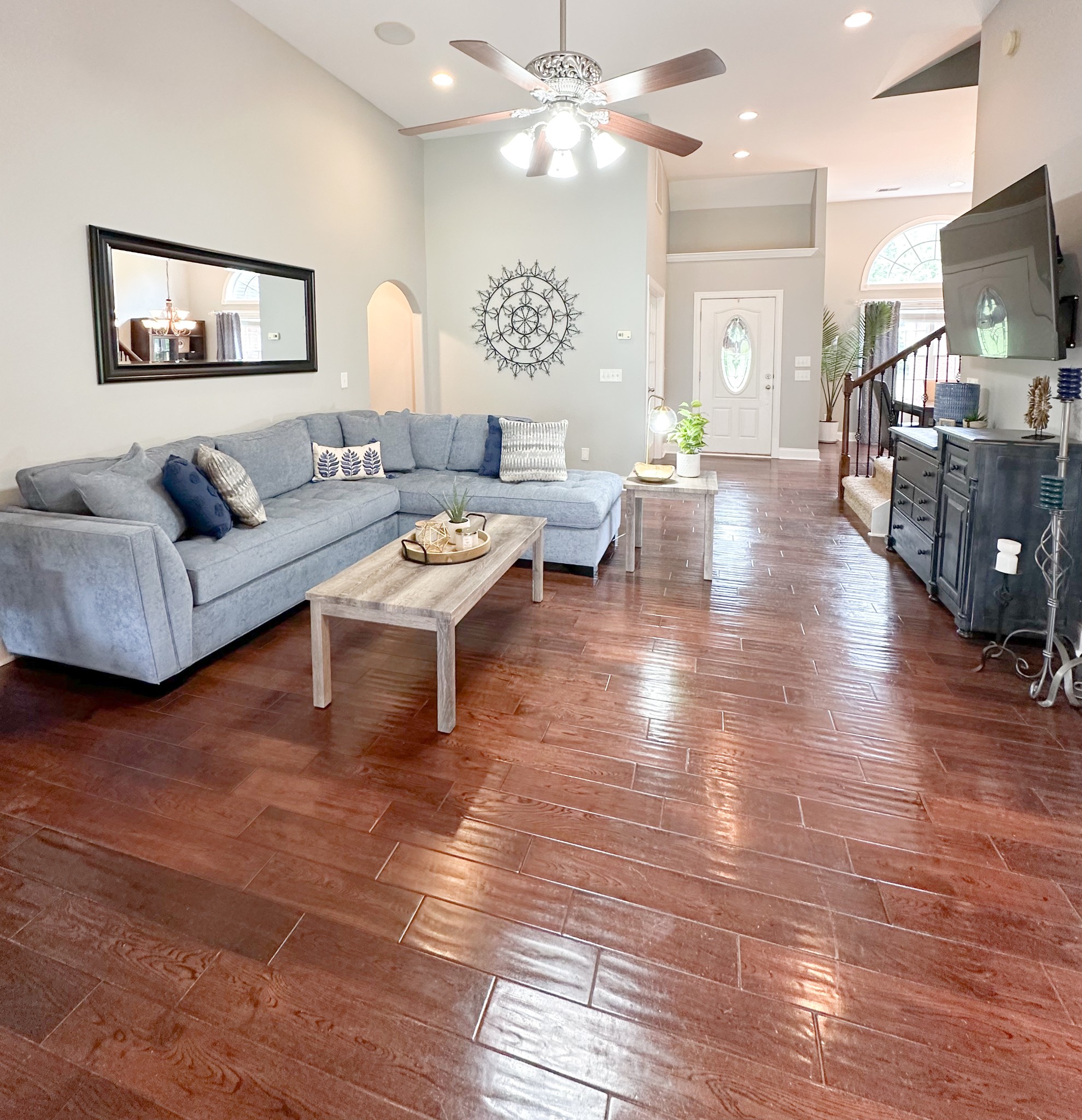 252 County House Hollow Road Cottontown, TN 37048 - Photo 8 of 50 a living room with furniture and a flat screen tv