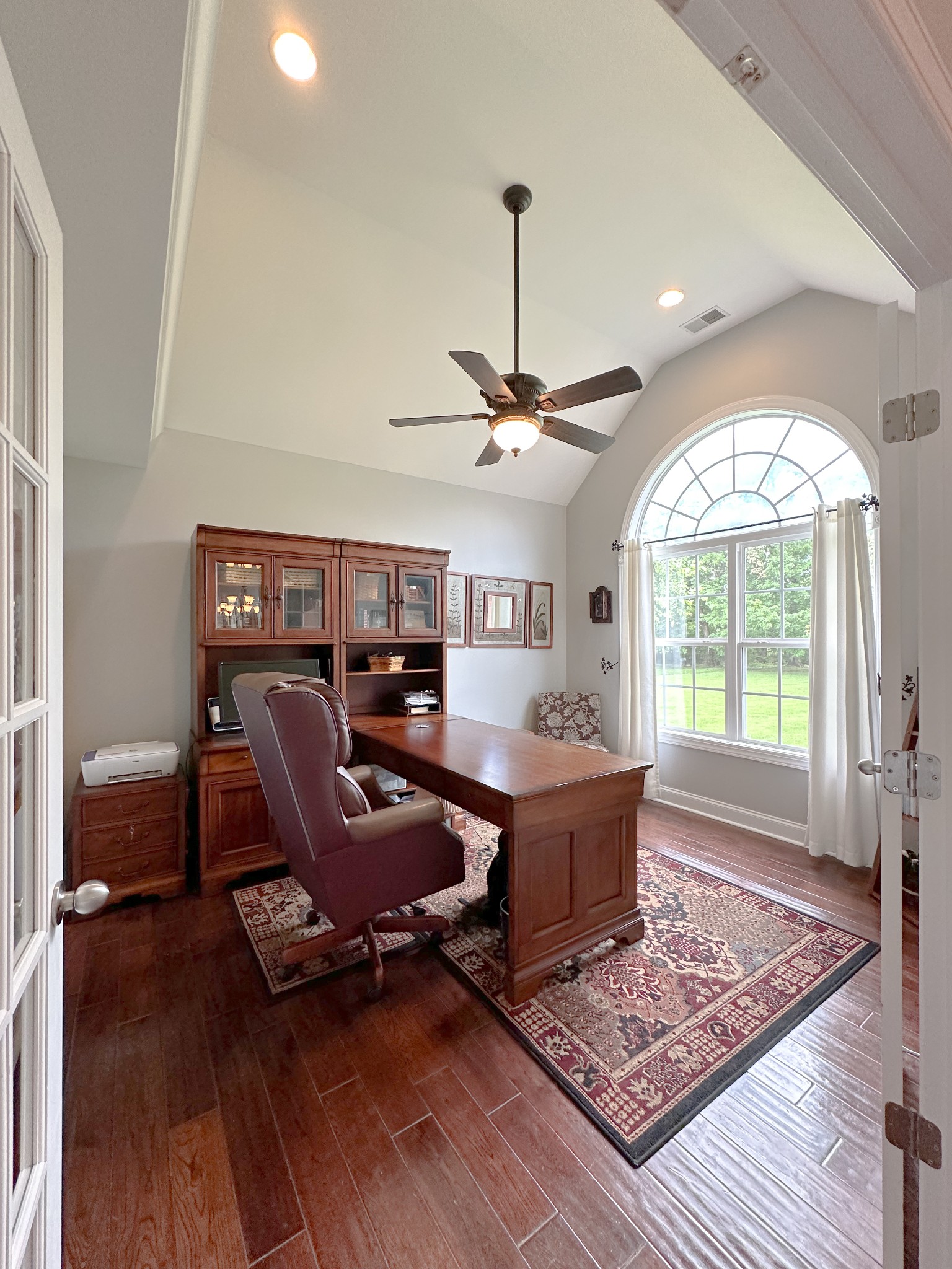 252 County House Hollow Road Cottontown, TN 37048 - Photo 10 of 50 a living room with furniture a window and a chandelier