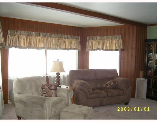 1601 State Road New Castle, PA 16101 - Photo 6 of 18 Living Room. This room gets morning and afternoon sun. Window treatments stay; neutral carpeting.