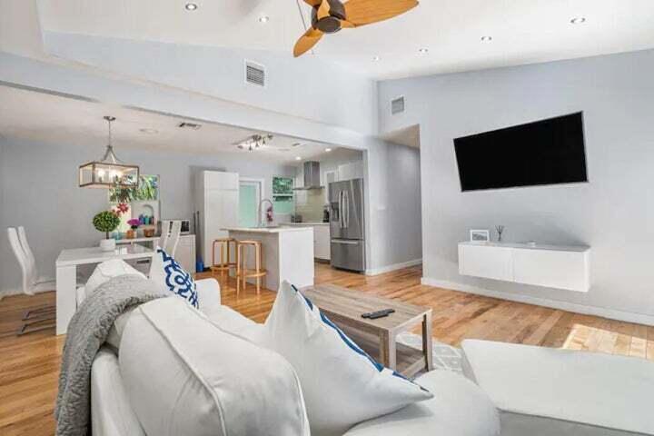 11 Southwest 4th Street Delray Beach, FL 33444 - Photo 5 of 27 a living room with furniture and a flat screen tv