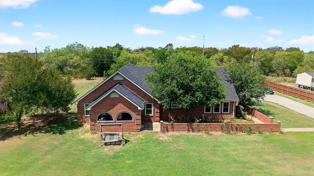 a house view with a garden space