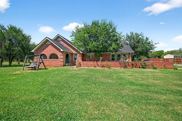 a house view with a garden space