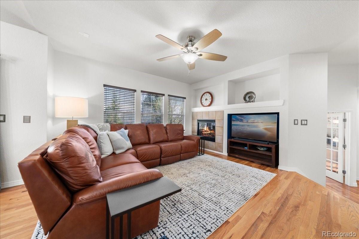 2730 River View Drive Broomfield, CO 80023 - Photo 9 of 48 a living room with furniture and a flat screen tv