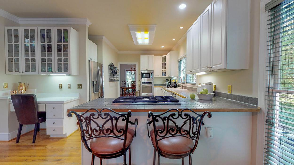 3545 Hope Valley Road Durham, NC 27707 - Photo 10 of 30 Kitchen with bar for eating or visiting with guests
