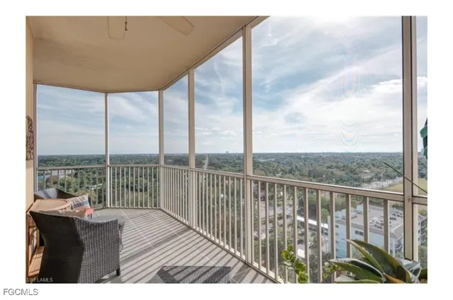 a balcony view with a lake view