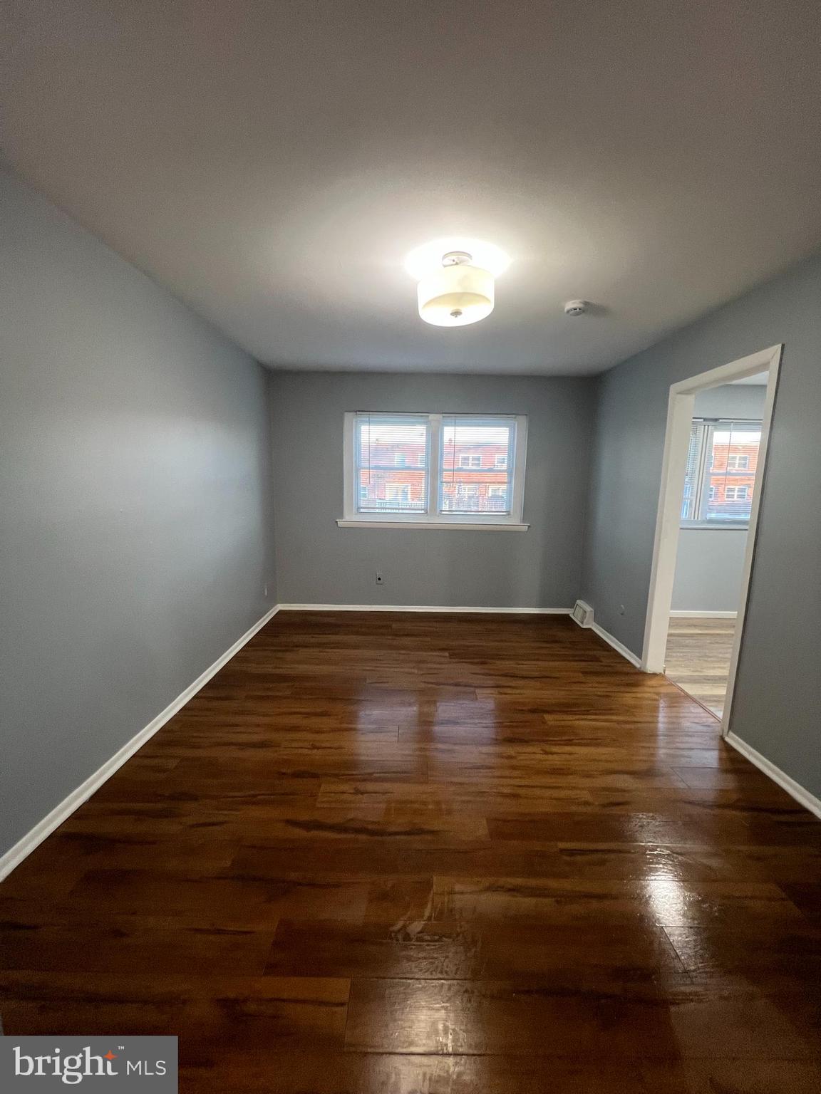 12785 Dunks Ferry Road Philadelphia, PA 19154 - Photo 7 of 12 an empty room with wooden floor and windows