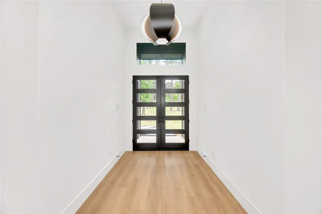 a view of a room with a front door